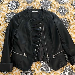 Black “vegan” leather ruffled jacket. Bought in Rome, Italy